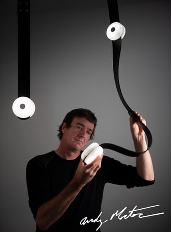 Andy Morter lighting designer with luxury pendant